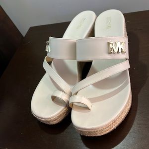 Cream Michael Kors platform wedges size 11. Worn twice.